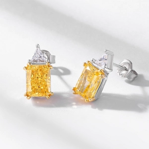Elegant S925 silver stud earrings featuring yellow radiant-cut stones and clear triangles