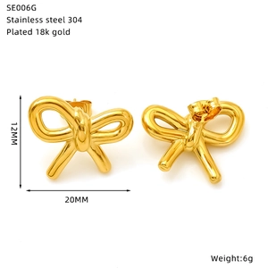 Macro view of 18k gold plated 304 stainless steel bow earrings with 20x12mm dimensions