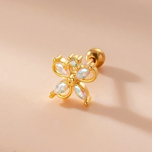 Detailed view of gold clover stud earring with rainbow gemstone and screw back closure