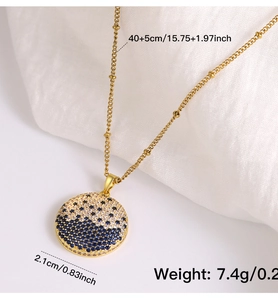 Detail of star-themed planet necklace showing 2.1cm pendant size and 45cm chain length