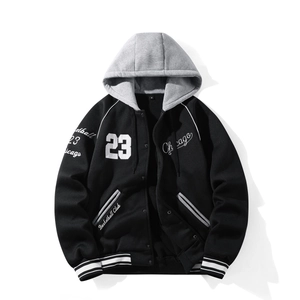 Detail of the embroidered Chicago 23 logo and striped rib cuffs on this baseball jacket