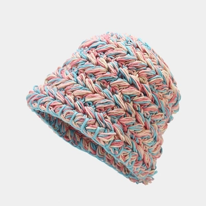 Detail of multi-color mixed chunky knit bucket hat showing thick crochet texture and roll edge