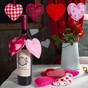 Set of 12 heart-shaped fabric ornaments with red and white patterns for Valentine's Day decor