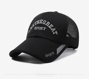 Detail view of black mesh baseball cap featuring white embroidery and reflective sport stripe