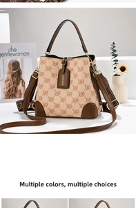 Close-up of vintage bucket bag featuring brown chain pattern and leather strap detail