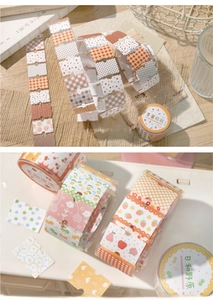 Detail of floral washi tape set featuring strawberry and lattice patterns for DIY crafts
