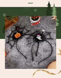 Detail of Halloween mesh headbands with glittery pumpkin, ghost, and spider web accents