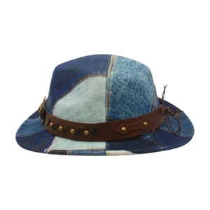 Detail view of denim patchwork fedora featuring a leather band with metal rivets