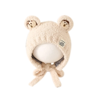 Warm beige plush baby bear hat with cute earflaps and chin straps for winter
