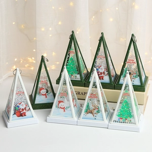 Christmas LED lantern decorative lamps with Santa and Reindeer patterns in warm festive setting
