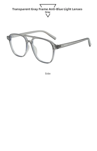 Macro detail of translucent grey pilot frame with anti-blue light lenses and metal rivets