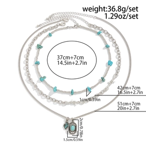 Three-layer bohemian silver necklace set with turquoise beads and cactus pendant detail