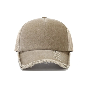 Distressed washed cotton baseball cap with mesh back and vintage torn brim in khaki