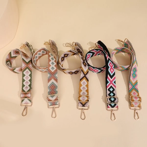 Five adjustable ethnic style wide fabric bag straps with metal hooks and geometric patterns