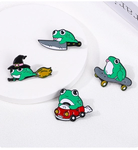 Set of four green enamel frog pins featuring wizard and skateboarder designs for clothing