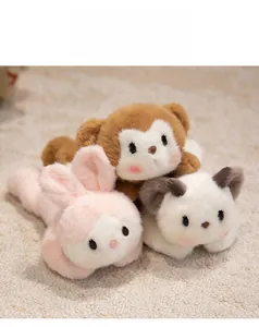 Detailed view of soft plush animal dolls including pink rabbit and brown monkey toys