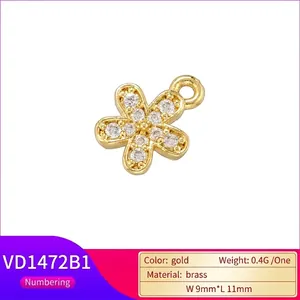 Elegant gold brass flower pendant with sparkling cubic zirconia in a 5-petal design