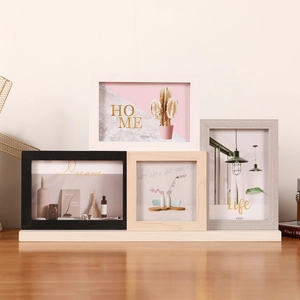 Set of four minimalist wooden photo frames in black, white, wood, and grey finishes