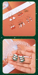 Macro shot of assorted Christmas earrings featuring holiday trees and candy canes
