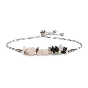 Adjustable stainless steel bracelet featuring natural raw stones and slider clasp