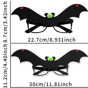 Close-up of black bat Halloween glasses with red sequins and precise size dimensions