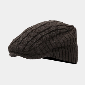 Retro dark brown cable-knit newsboy cap for winter with a stylish vintage texture