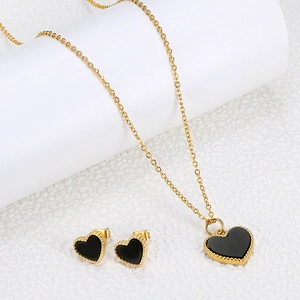 Elegant gold titanium steel jewelry set with black heart pendant necklace and stud earrings