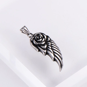 Retro silver feather wing and rose flower metal pendant in vintage gothic style
