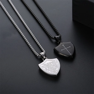 Shield pendant necklaces in silver and black with engraved scripture and cross design