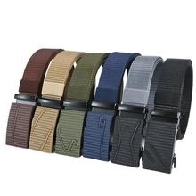 Detail of six nylon belts in various colors with textured geometric buckle designs