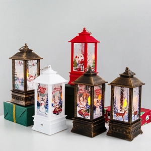 Christmas LED lanterns with Santa and snowman designs for festive tabletop decoration