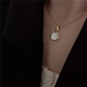 Elegant 18k gold plated titanium steel necklace with white hexagon shell pendant for women