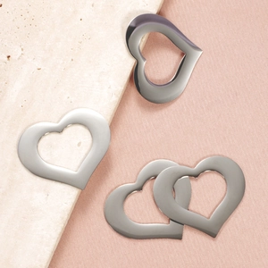 Set of four hollow heart-shaped stainless steel pendants for DIY necklace jewelry making