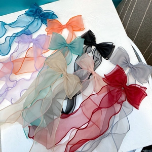 Multi-colored chiffon bow hair clips with long ribbons in vibrant silk fabric