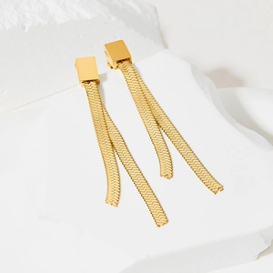 Elegant gold square stud earrings with long snake chain tassels on a white stone block