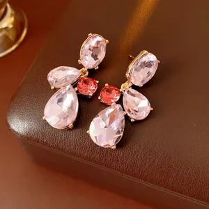 Vintage teardrop crystal stud earrings with gold base in floral cluster design