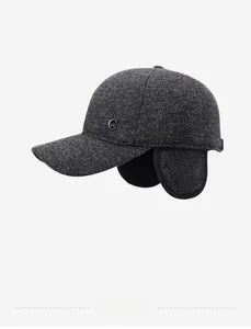 Detail view of winter baseball cap with ear flaps and thick thermal fleece lining