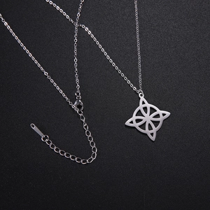 Close-up of silver Viking compass necklace with adjustable chain and lobster clasp