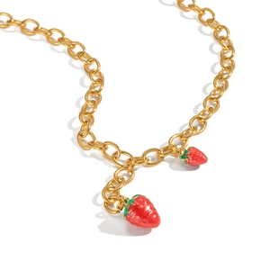 Detailed view of 18K gold stainless steel chain with 3D red and green strawberry charms