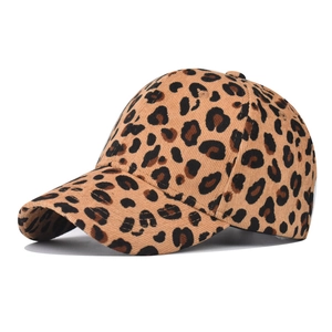 Close-up of leopard print baseball cap in brown corduroy with structured curved brim
