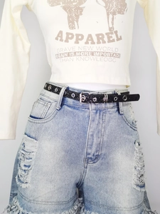 Y2K western style sparkling rhinestone belt styled with cropped top and denim shorts