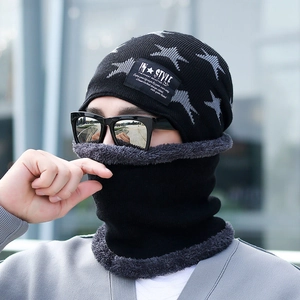 Detail of winter knit hat and neck warmer set with star pattern and soft fleece lining