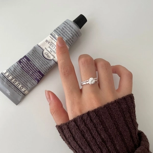 Minimalist 925 sterling silver beaded ring set with irregular lava texture finish