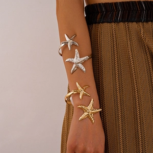 Golden and silver irregular starfish open arm cuffs with realistic metal textures
