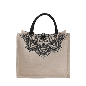 Linen tote bag with black handles and floral mandala print on natural burlap fabric