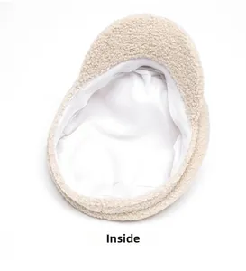 Detailed interior of the beige teddy fleece military hat showing soft lining and sweatband