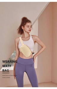 Detail of adjustable strap and buckle on cream running waist bag for sports