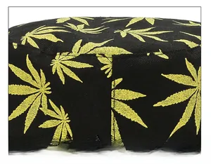 Close-up of strict cap suture technique on leaf print tie-dye bucket hat fabric