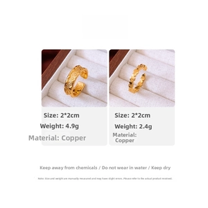 Detail view of 24k gold plated copper rings with product dimensions and weight specs