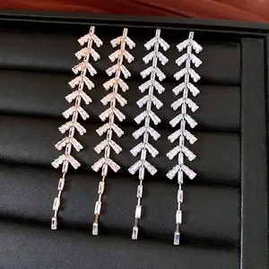 Leaf tassel zircon earrings in gold and silver finish with long geometric fringe drop